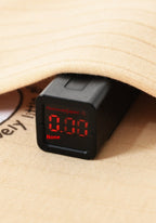 Fluorescent agent detection device with digital display on a wooden surface